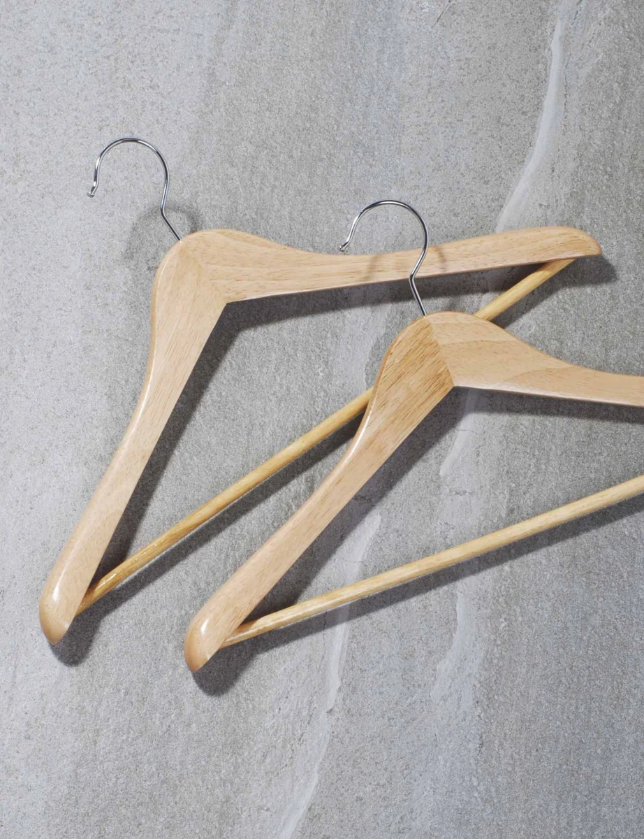 Natural wood hangers with metal hooks